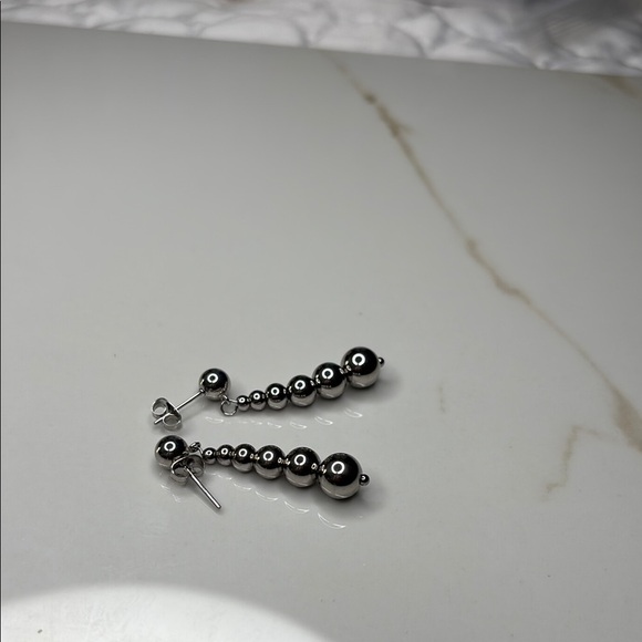Elegant Silver Drop Earrings - Picture 2 of 3